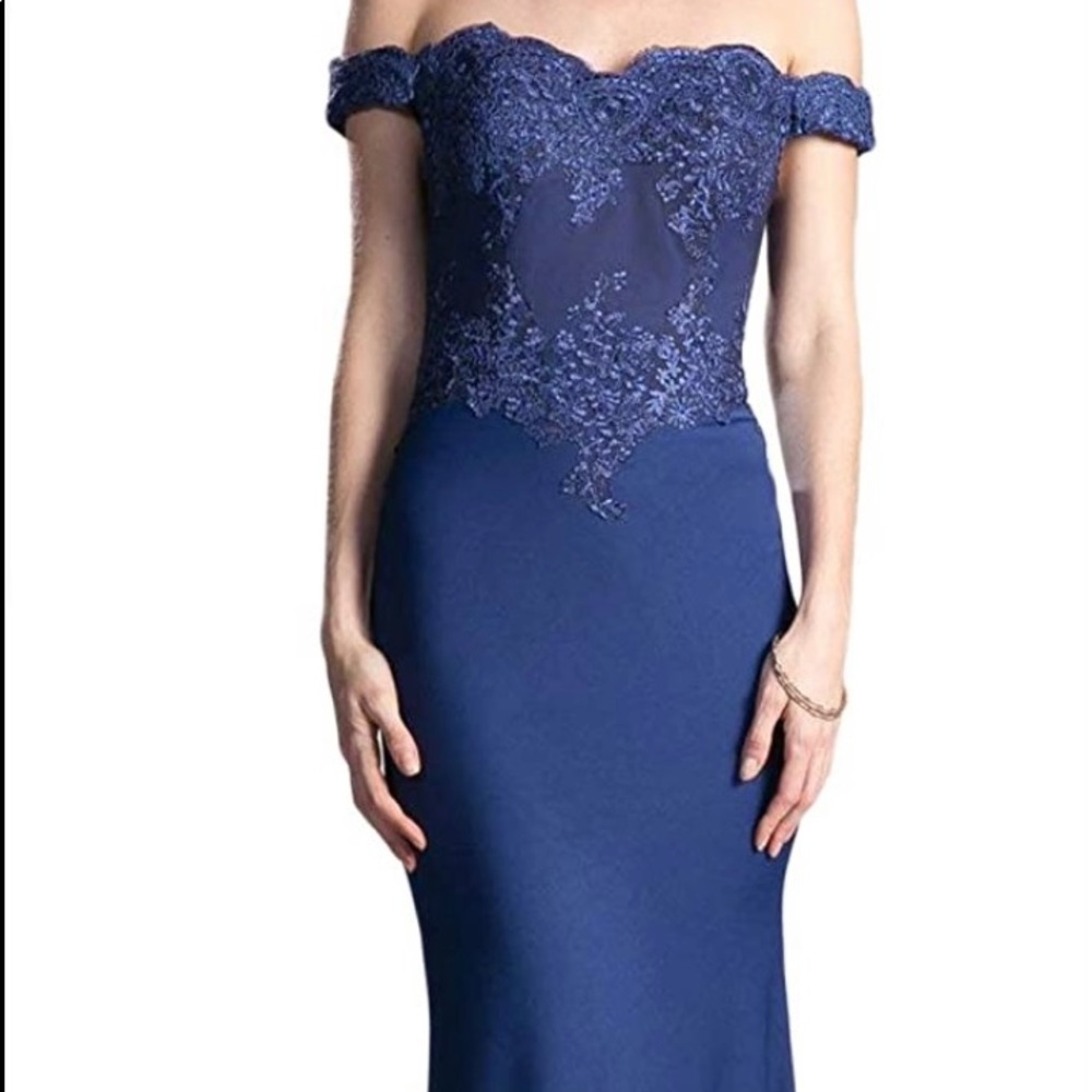 Navy blue off the shoulder lace mermaid prom dress. Stretchy satin material.